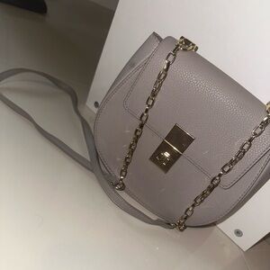 Grey with gold accessory